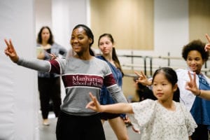 Children singing and dancing at Manhattan School of Music's summer program